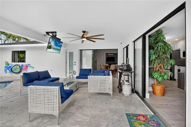 a view of a swimming pool with lounge chair