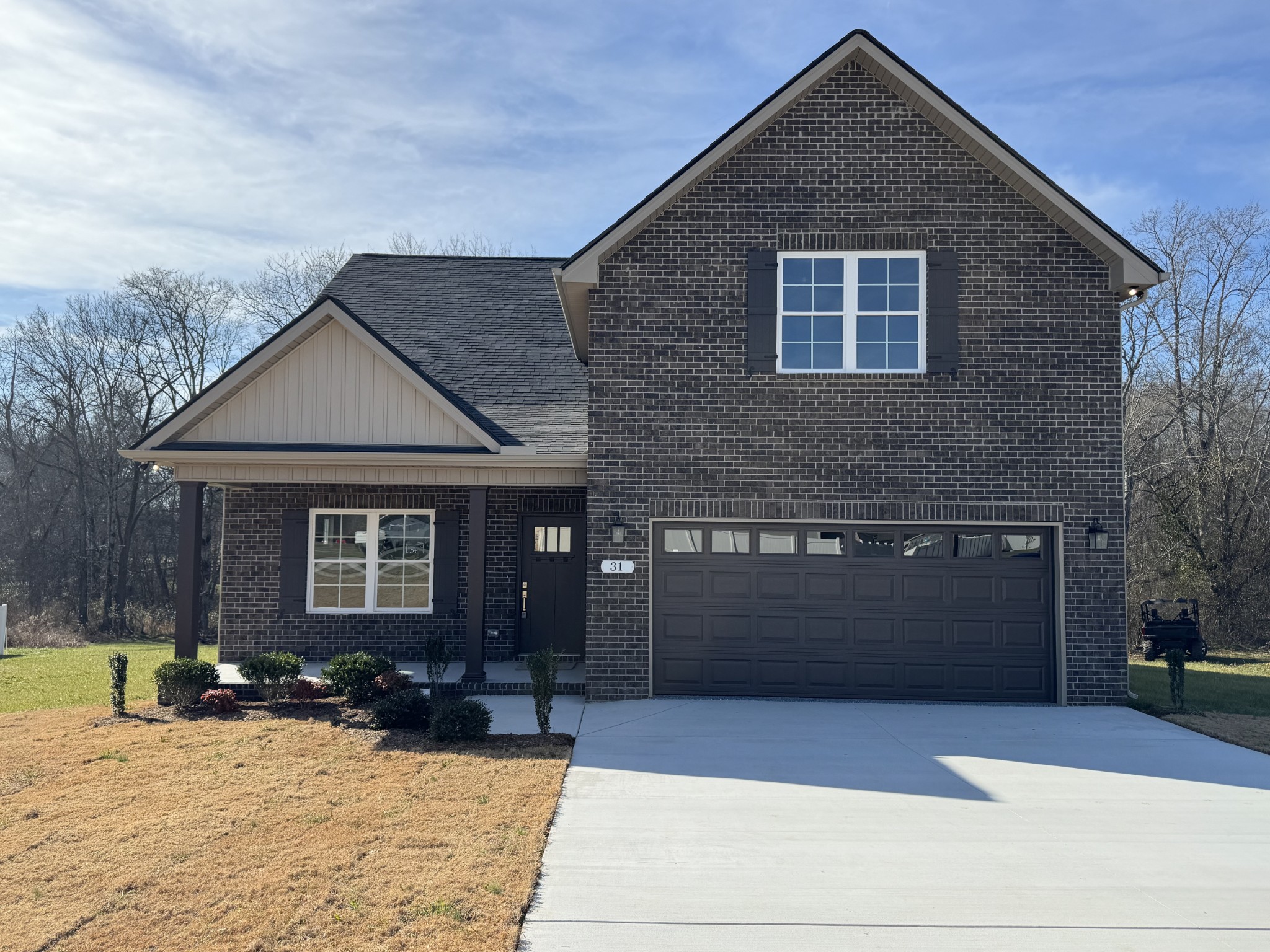 a front view of a house with yard