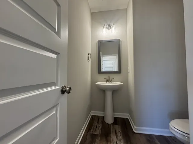 a bathroom with a sink a toilet
