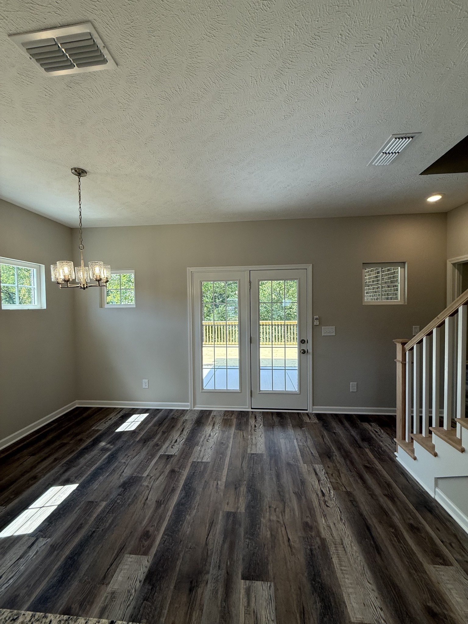 31 Spring House Drive Manchester, TN 37355 - Photo 22 of 32 a view of an empty room with wooden floor and a window