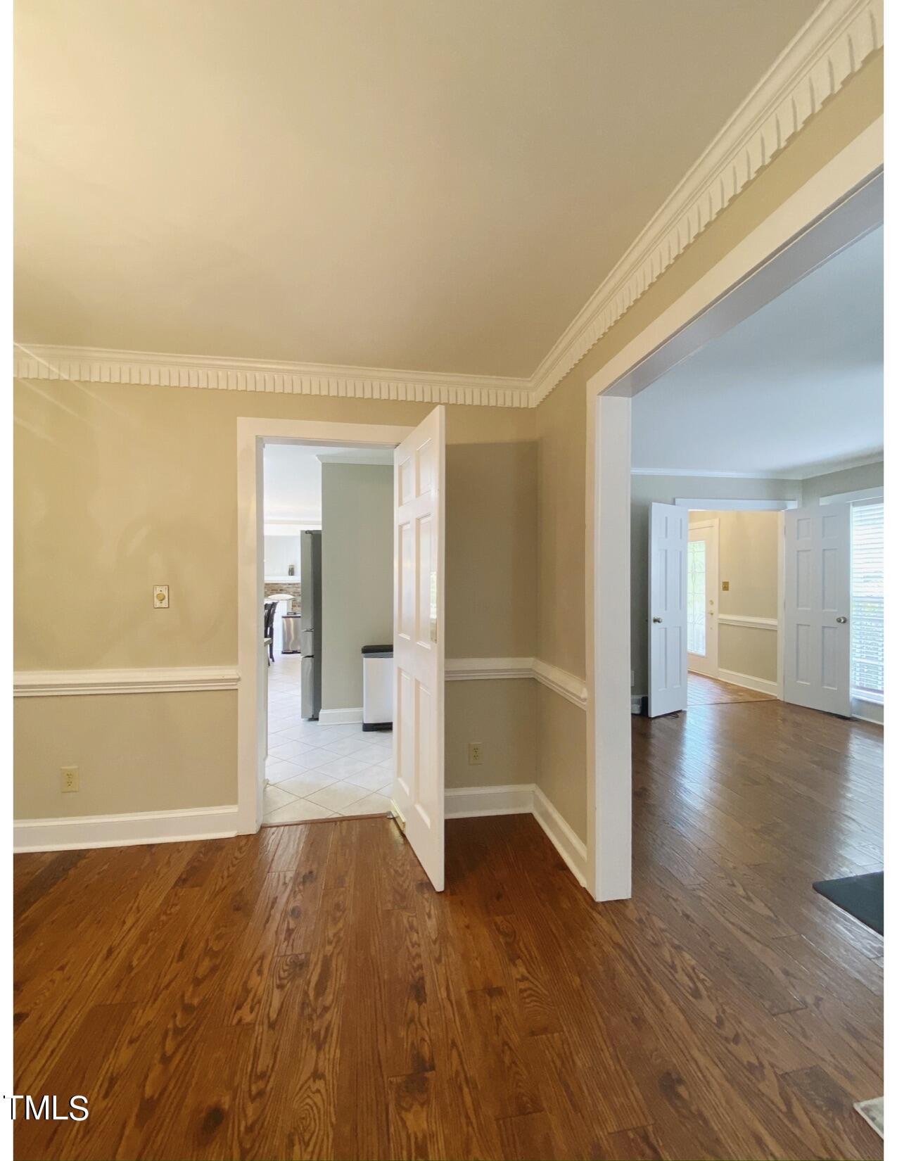 2000 Cayuga Place Raleigh, NC 27612 - Photo 19 of 31 a view of a big room with wooden floor and windows