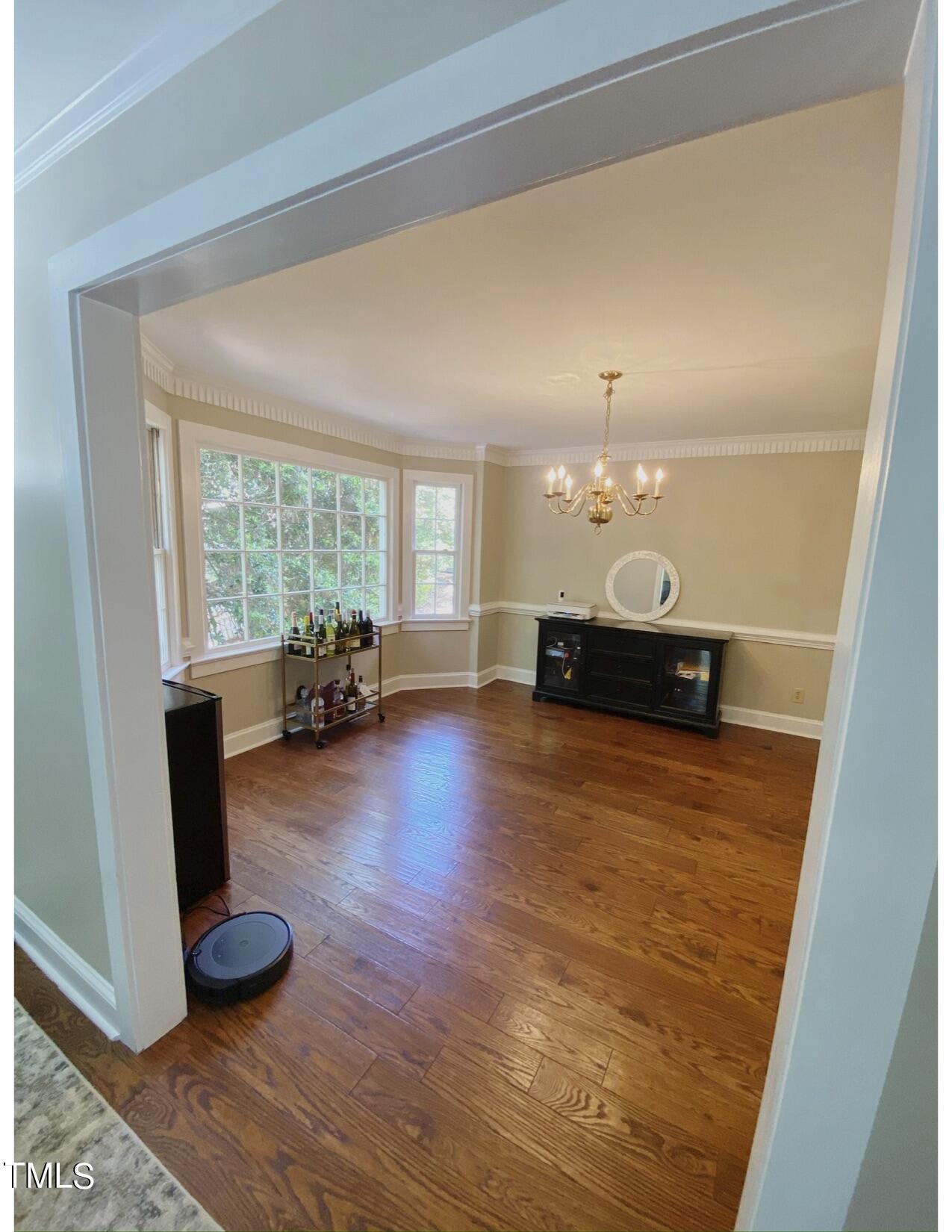 2000 Cayuga Place Raleigh, NC 27612 - Photo 20 of 31 a living room with furniture and a large window