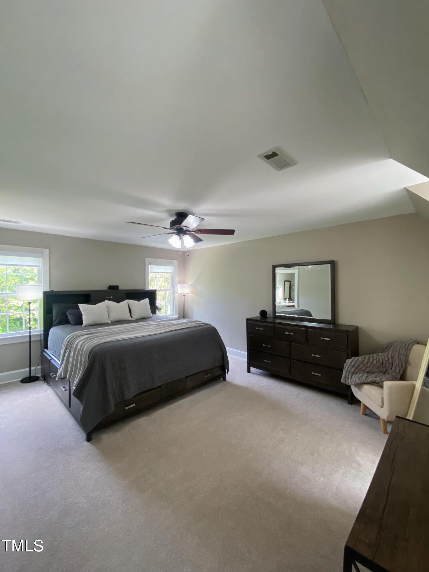2000 Cayuga Place Raleigh, NC 27612 - Photo 22 of 31 a bedroom with a bed and a couch
