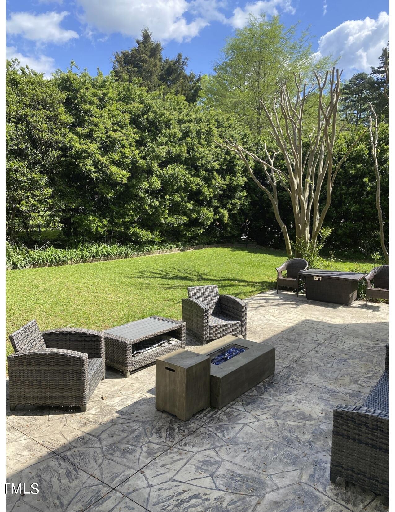 2000 Cayuga Place Raleigh, NC 27612 - Photo 6 of 31 a view of a garden with lawn chairs