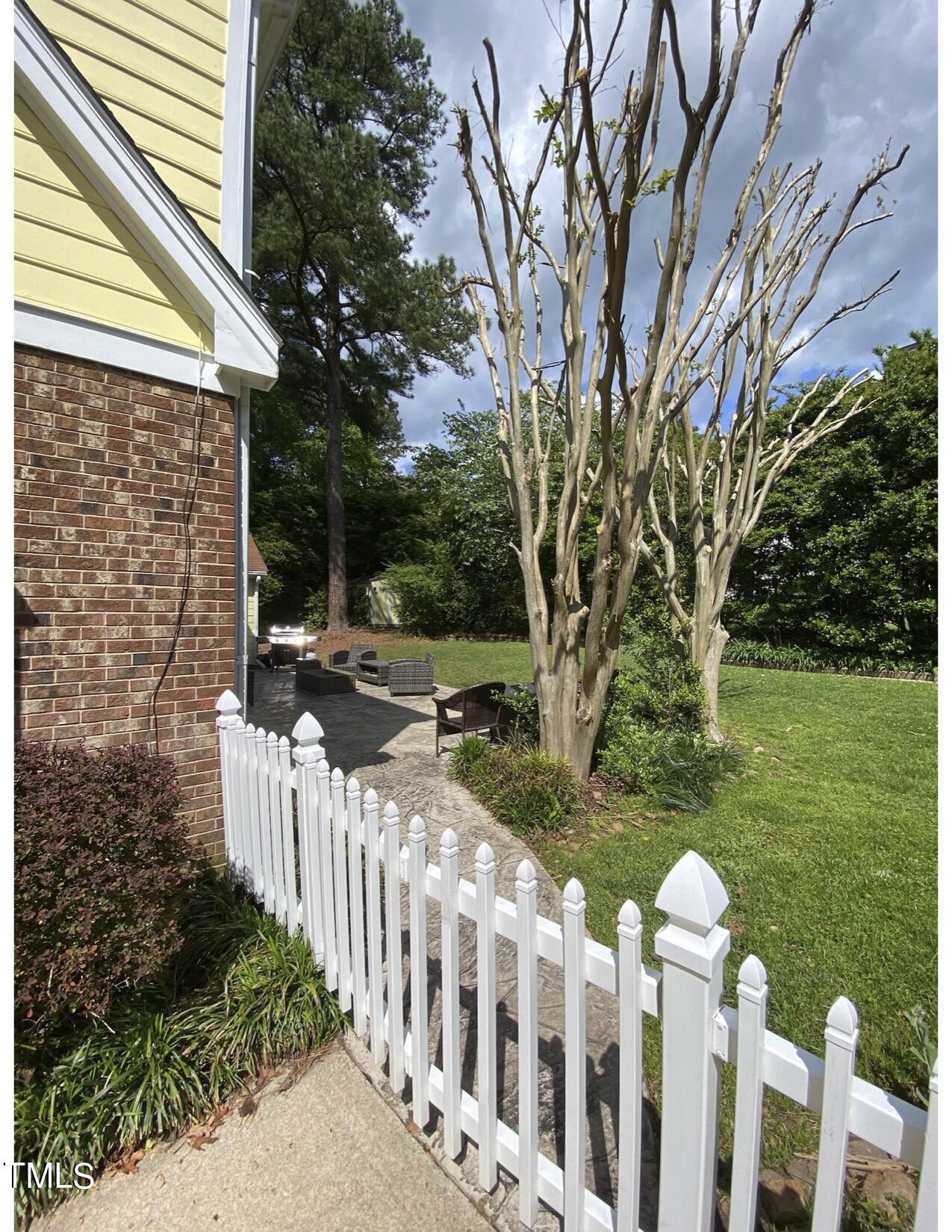 2000 Cayuga Place Raleigh, NC 27612 - Photo 9 of 31 a view of a wooden fence