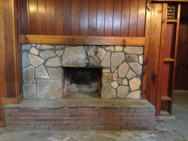 66 West Warren Road Ware, MA 01082 - Photo 18 of 25 a room with a fireplace