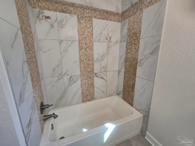 a bathroom with a tub