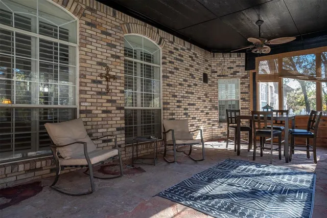 a outdoor dining space with furniture