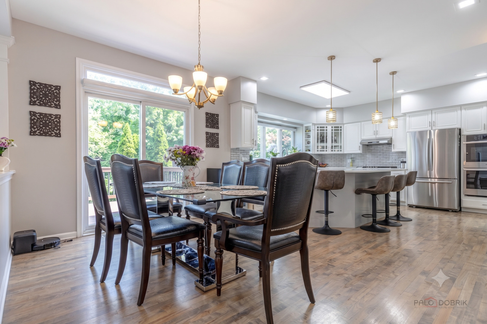 2627 Rutland Road Naperville, IL 60564 - Photo 8 of 38 a view of a dining room with furniture window and wooden floor