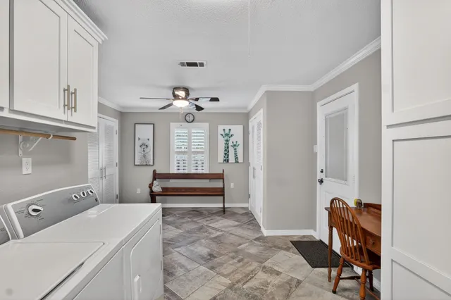 a room with a bed and furniture