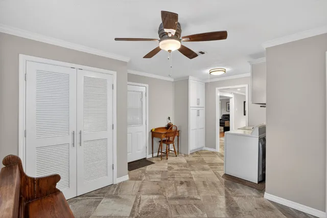 a view of a livingroom with furniture and furniture