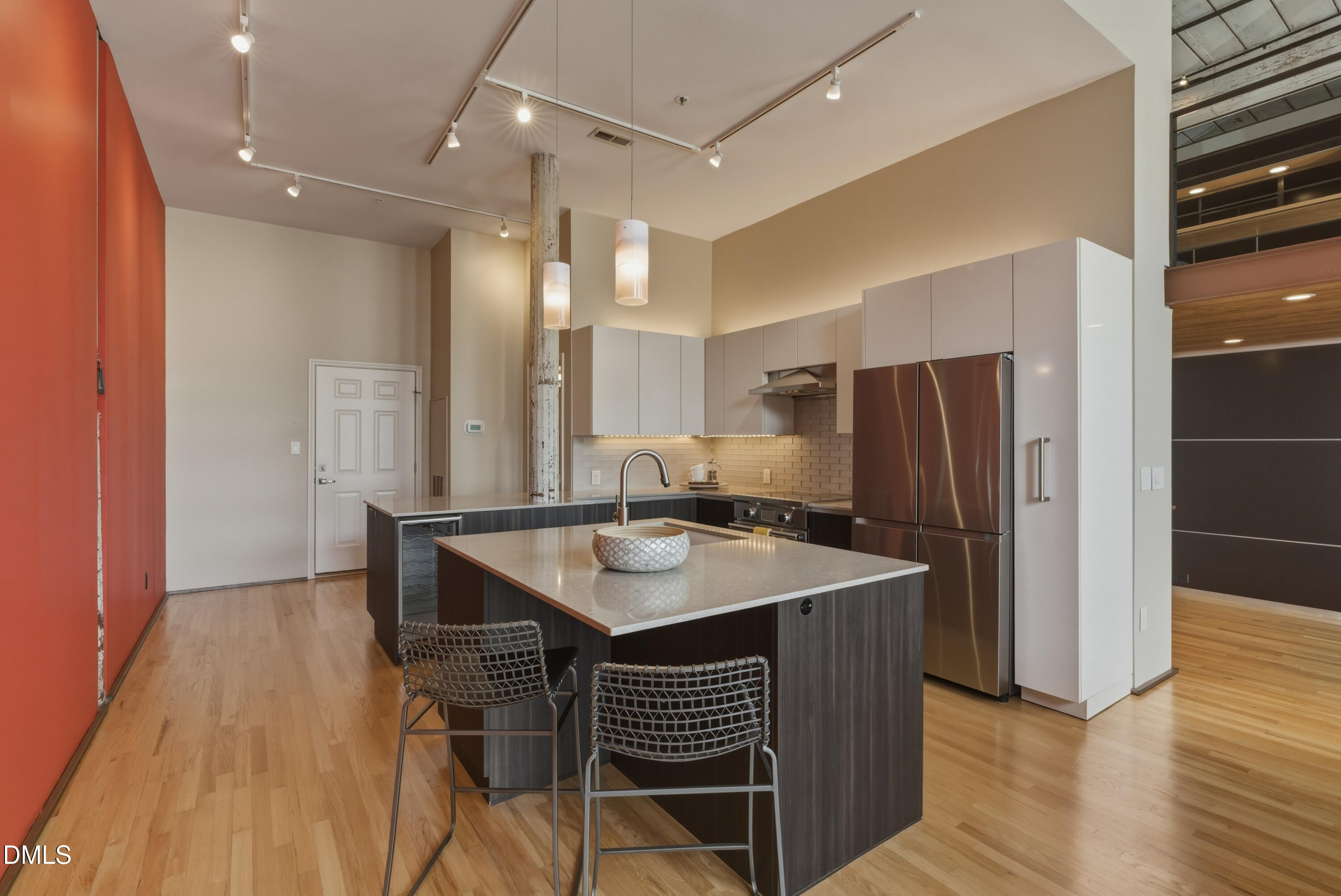 614 Capital Boulevard, Unit 114 Raleigh, NC 27603 - Photo 12 of 33 a kitchen with a table and chairs in it