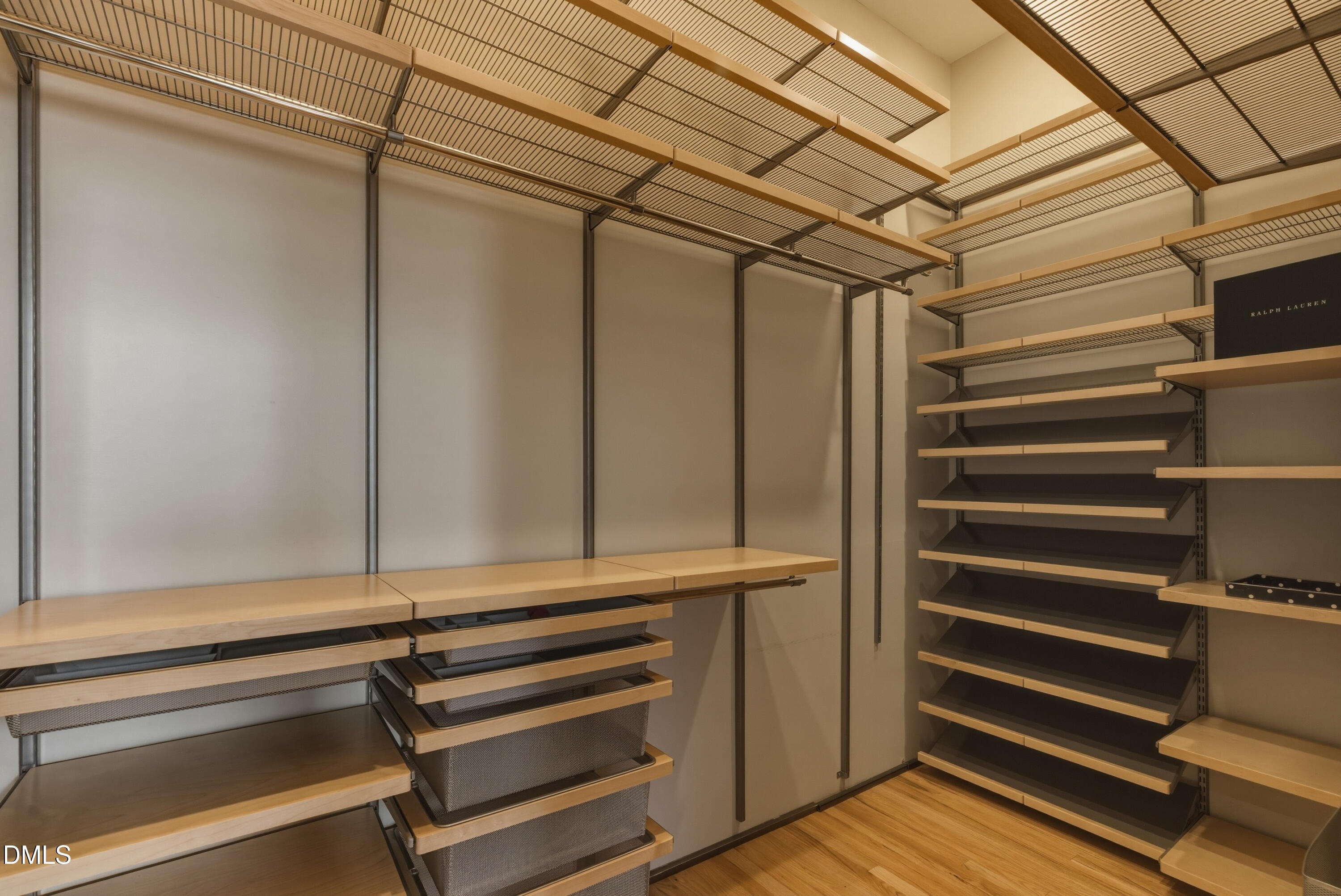 614 Capital Boulevard, Unit 114 Raleigh, NC 27603 - Photo 24 of 33 a view of walk in closet with empty racks