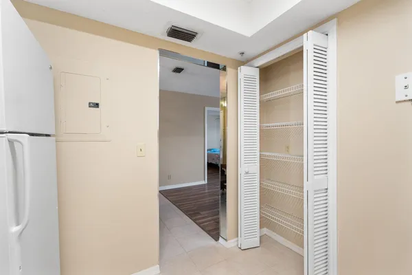 a view of a bathroom from a hallway