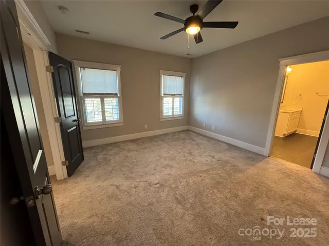 a bathroom with a double vanity sink and mirror