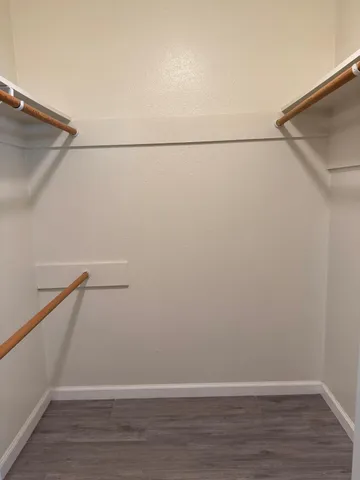 a view of a room with racks on the wall