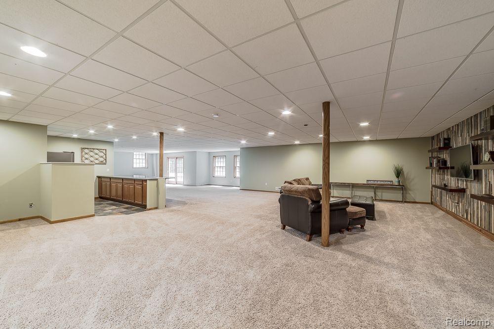 8360 Woodview Road Clarkston, MI 48348 - Photo 40 of 61 Endless possibilities in this lower level!