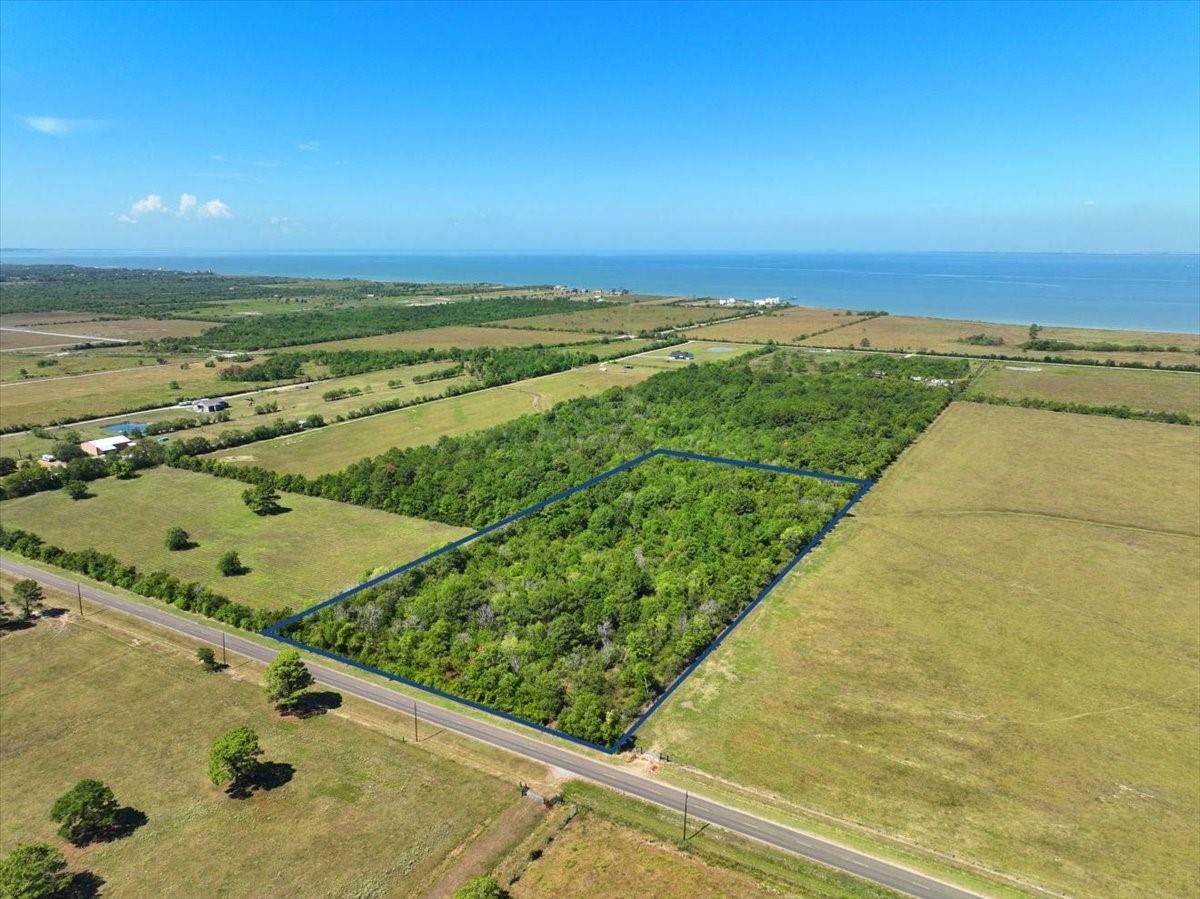 6246 Eagle Road Anahuac, TX 77514 - Photo 4 of 6 a view of an ocean from a balcony
