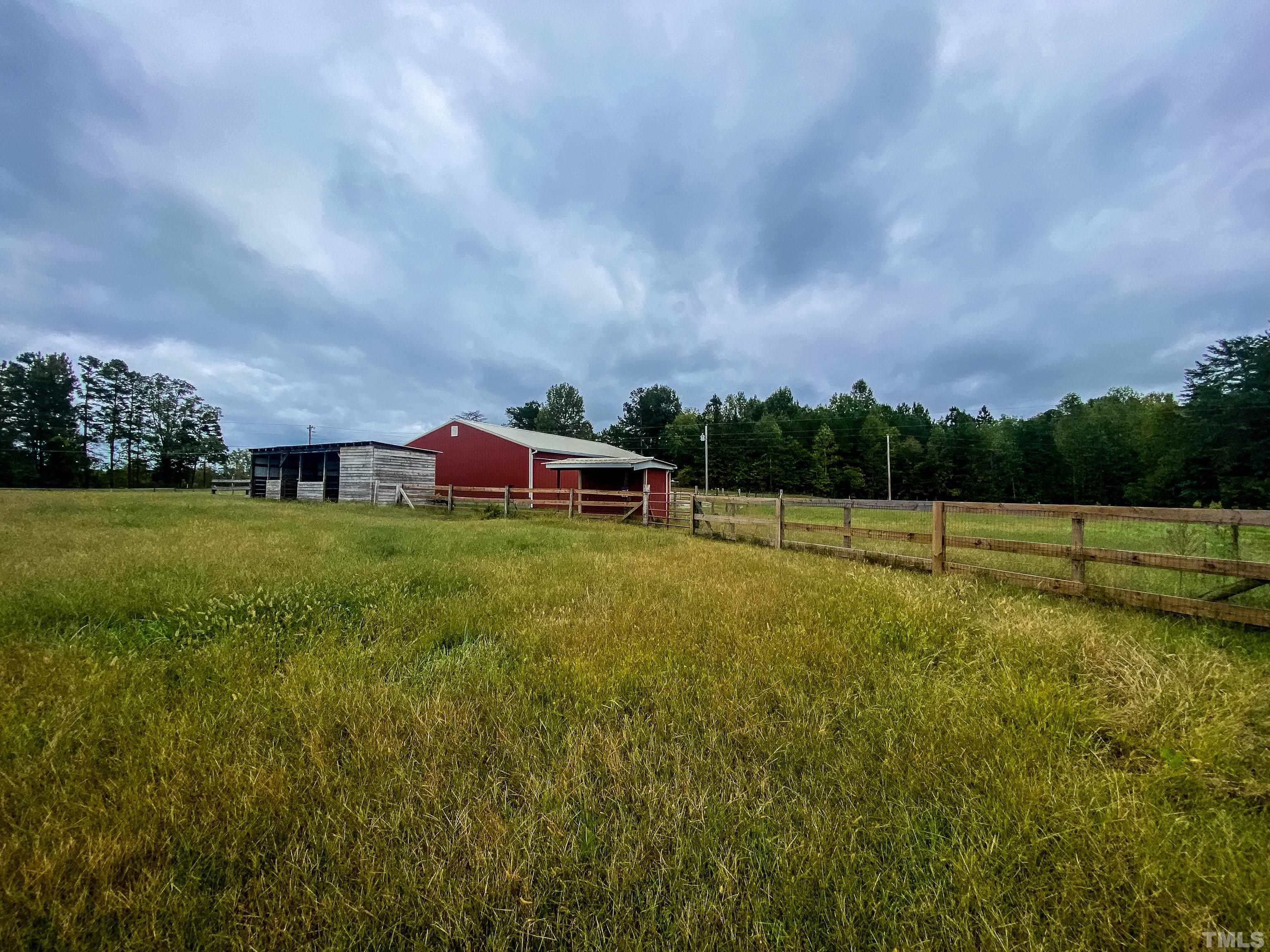 3920 Oxford Road Roxboro, NC 27574 - Photo 27 of 30 a view of a golf course with a garden