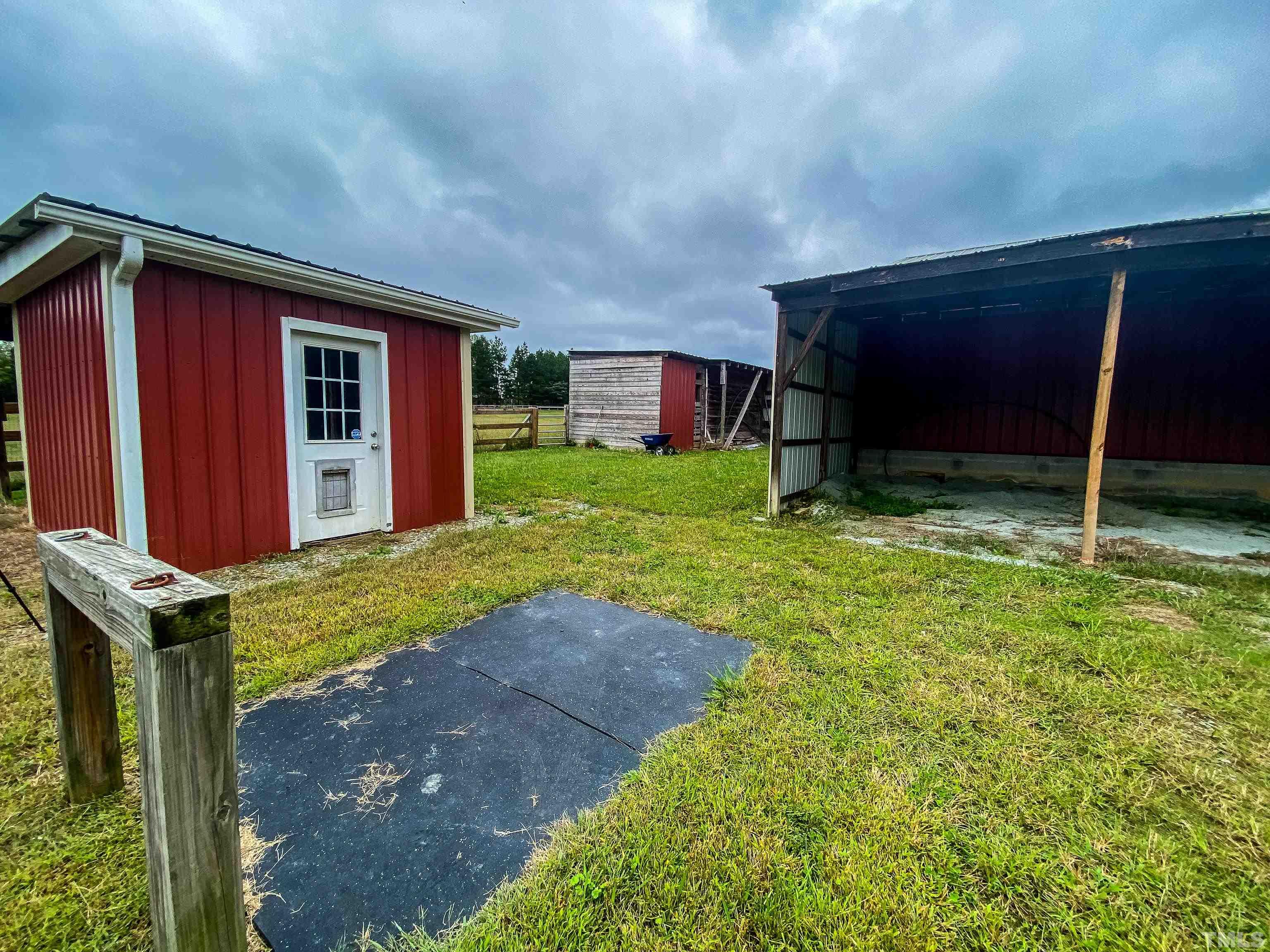 3920 Oxford Road Roxboro, NC 27574 - Photo 29 of 30 a view of a house with backyard
