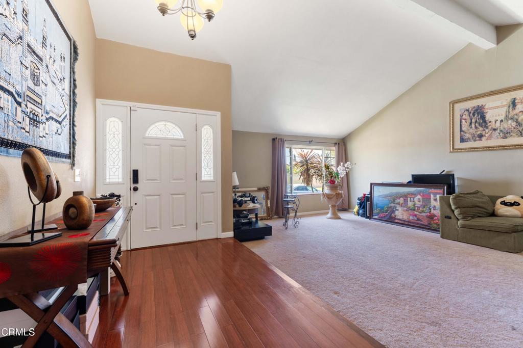 1421 East Abbottson Street Carson, CA 90746 - Photo 3 of 18 a view of a livingroom with furniture and a workspace