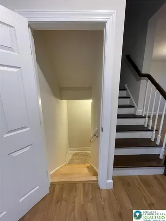 a view of a hallway with staircase