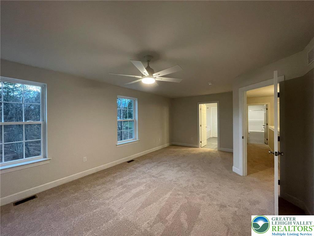 5043 Chapmans Road Orefield, PA 18069 - Photo 10 of 18 an empty room with windows and closet