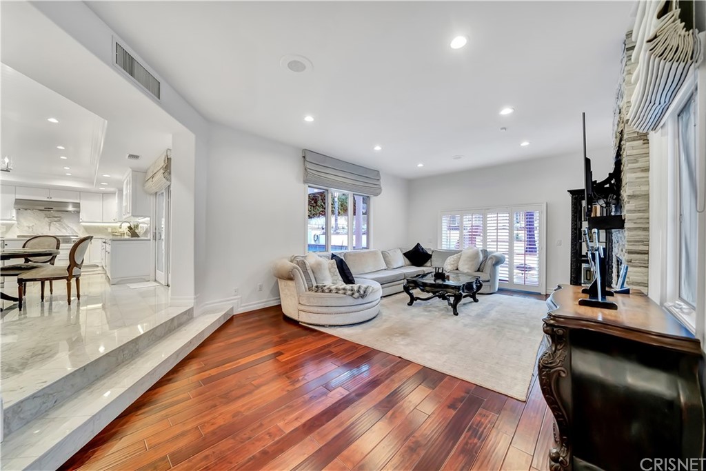 22963 Cass Avenue Woodland Hills, CA 91364 - Photo 32 of 66 Family room open to kitchen