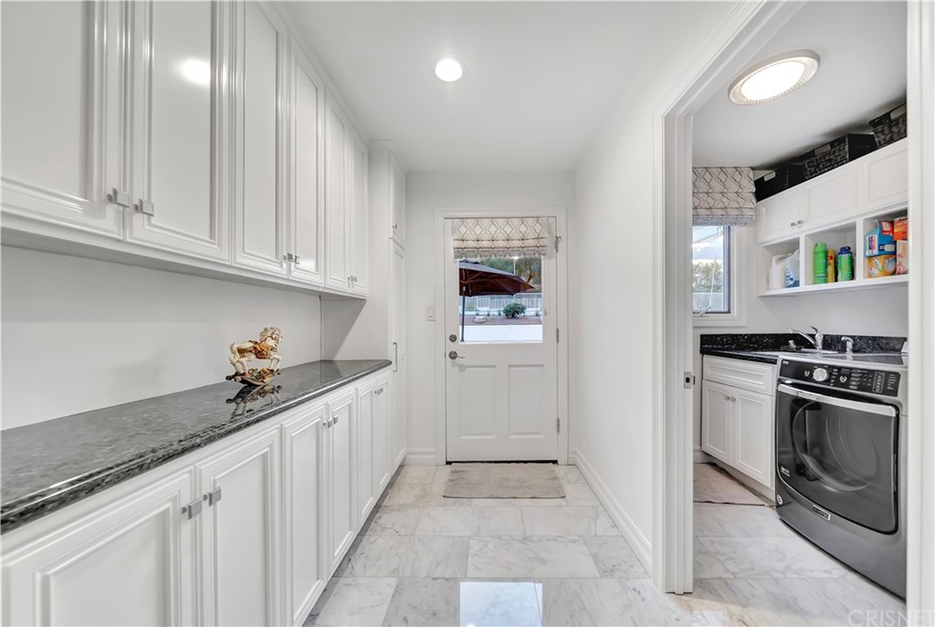 22963 Cass Avenue Woodland Hills, CA 91364 - Photo 39 of 66 Mud room access from garage and pool