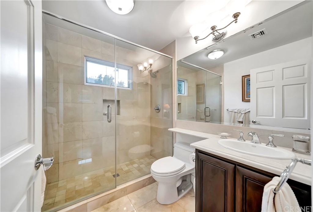 22963 Cass Avenue Woodland Hills, CA 91364 - Photo 42 of 66 Downstairs master 3/4 bath