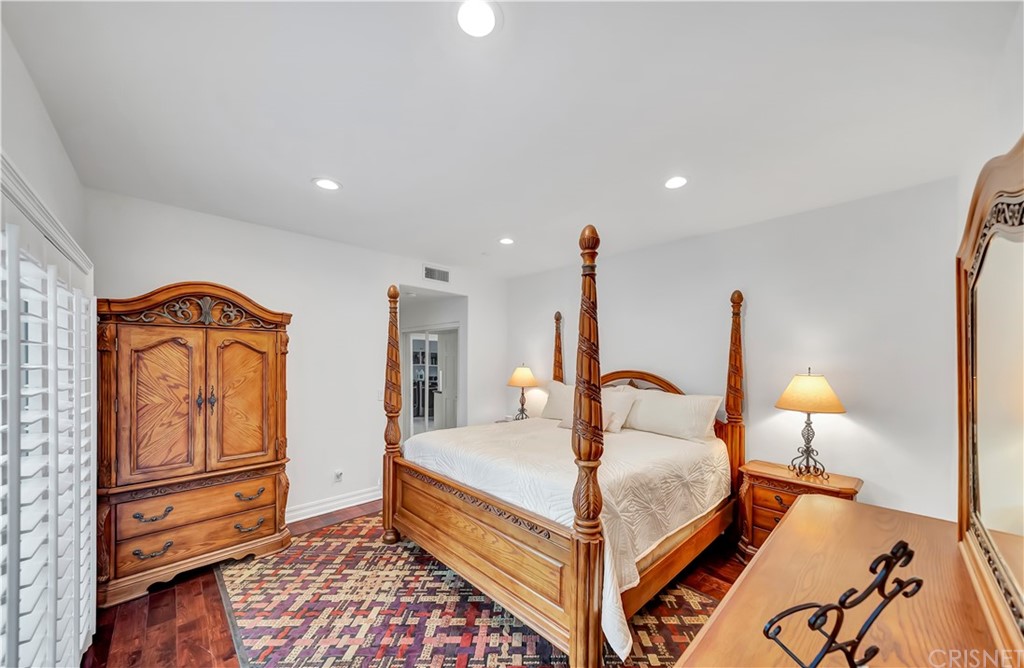 22963 Cass Avenue Woodland Hills, CA 91364 - Photo 43 of 66 Downstairs master with pool view