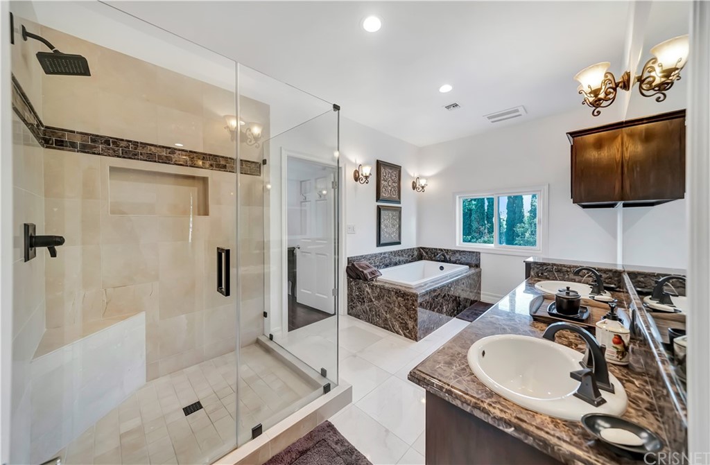22963 Cass Avenue Woodland Hills, CA 91364 - Photo 46 of 66 Jack and Jill full bathroom with walk-in shower