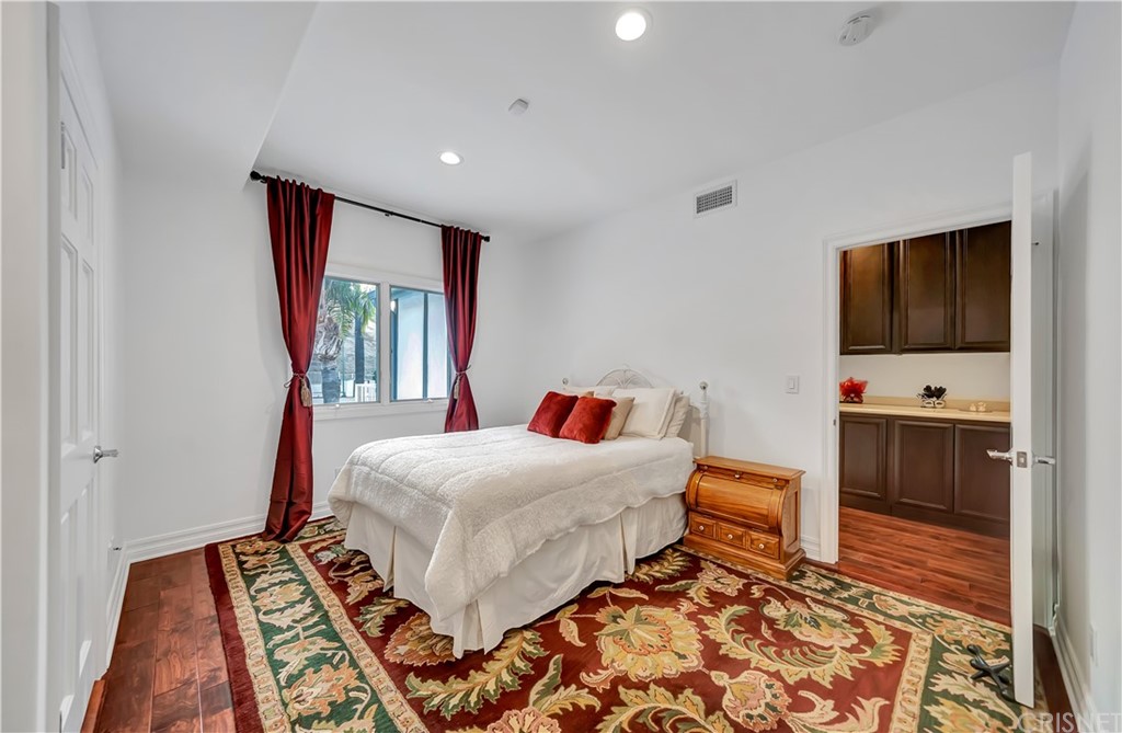 22963 Cass Avenue Woodland Hills, CA 91364 - Photo 54 of 66 Kids room with 3/4 bath