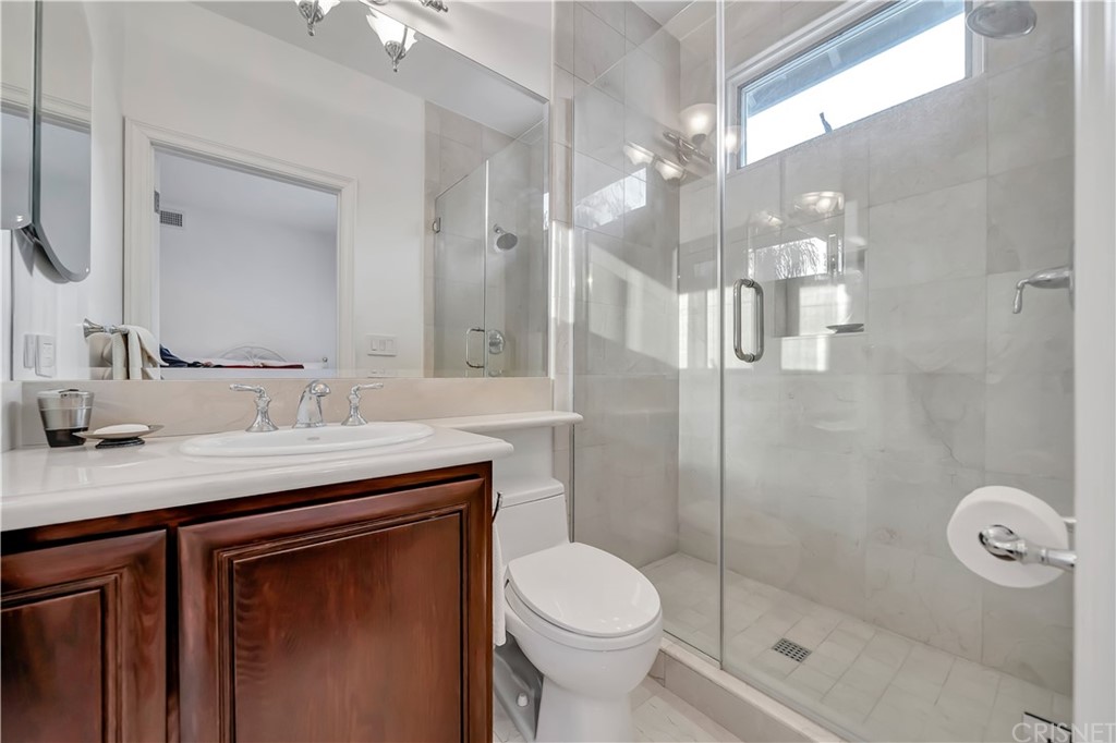 22963 Cass Avenue Woodland Hills, CA 91364 - Photo 56 of 66 Kids room 3/4 bath