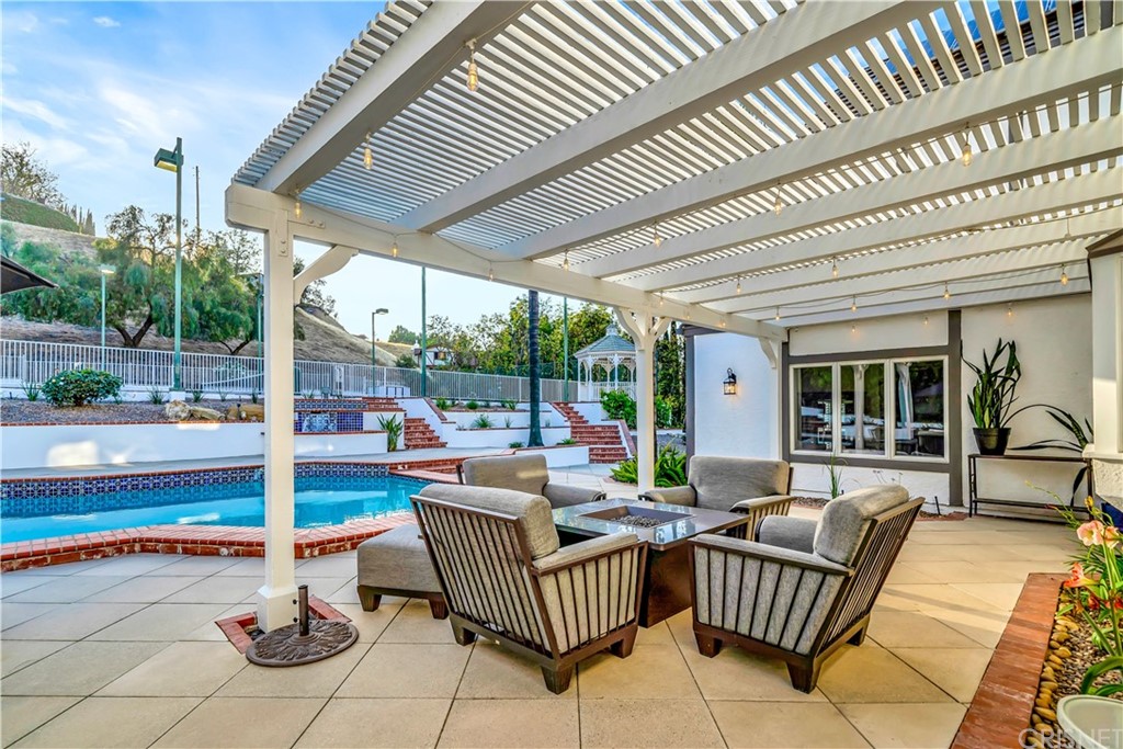 22963 Cass Avenue Woodland Hills, CA 91364 - Photo 59 of 66 Back covered patio