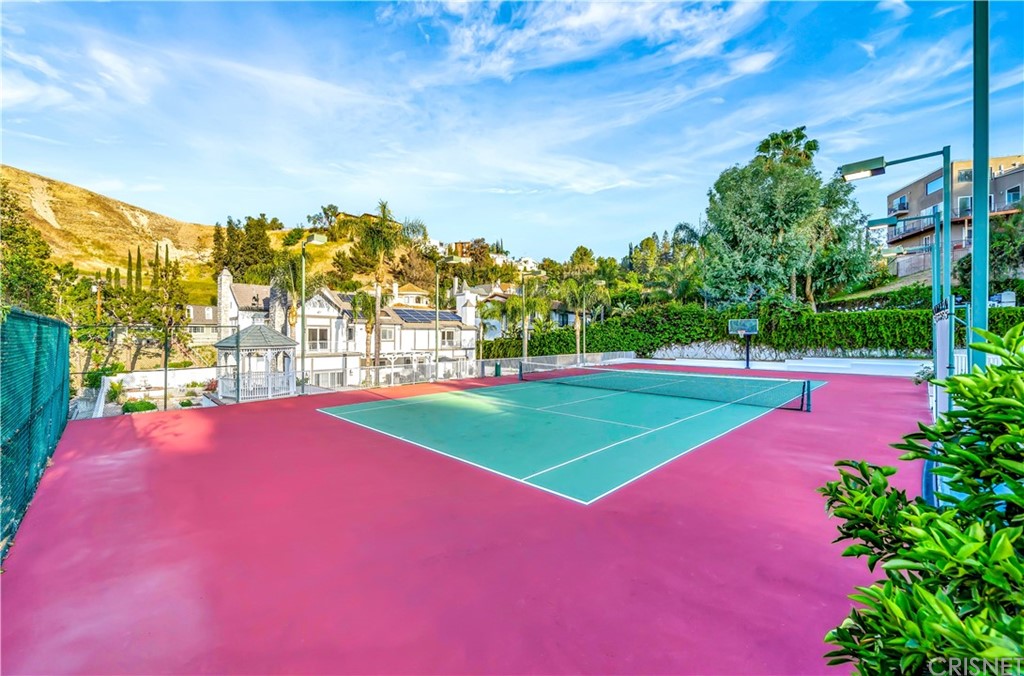 22963 Cass Avenue Woodland Hills, CA 91364 - Photo 62 of 66 Regulation size tennis court with filtered water drinking fountain