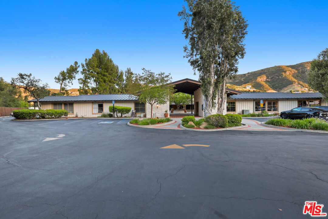 53 Saddlebow Road Bell Canyon, CA 91307 - Photo 66 of 66 a view of house with outdoor space and shower