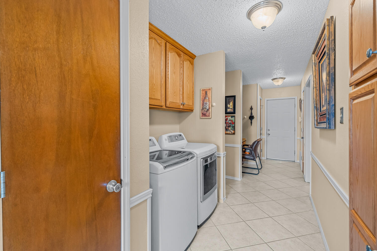 1500 West Lynn Street Slaton, TX 79364 - Photo 14 of 37 a kitchen with a refrigerator a stove top oven