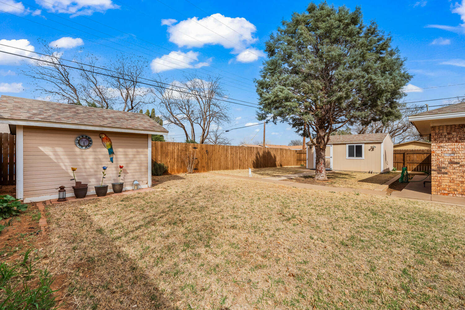 1500 West Lynn Street Slaton, TX 79364 - Photo 32 of 37 a house view with a outdoor space