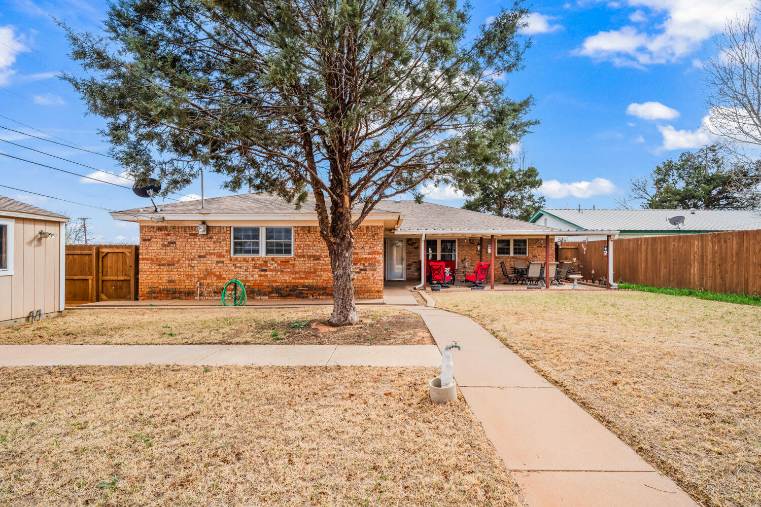 1500 West Lynn Street Slaton, TX 79364 - Photo 33 of 37 a view of a yard in front of a house