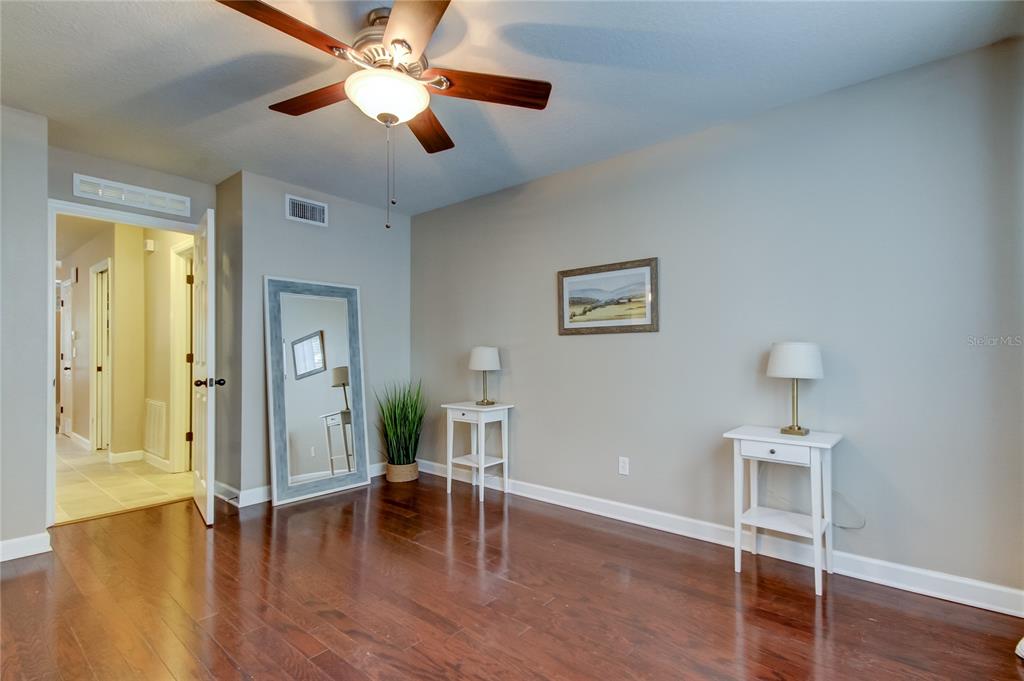 2123 West Spruce Street Tampa, FL 33607 - Photo 19 of 40 a view of empty room with wooden floor