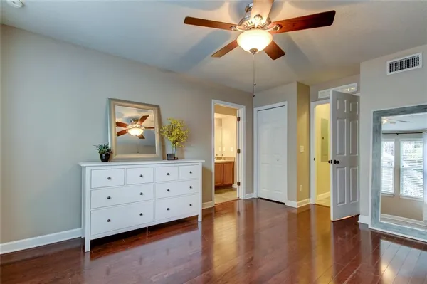 a view of a livingroom with wooden floor