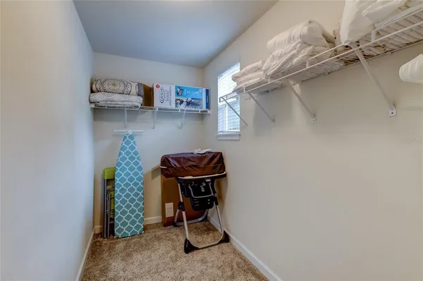 a room with cabinets and wooden floor