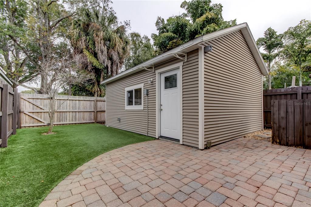 2123 West Spruce Street Tampa, FL 33607 - Photo 33 of 40 a view of a house with a yard