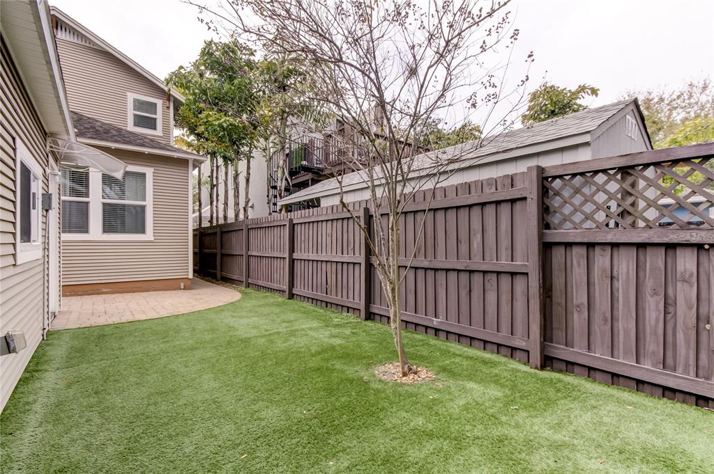 2123 West Spruce Street Tampa, FL 33607 - Photo 37 of 40 a view of a backyard with a garden