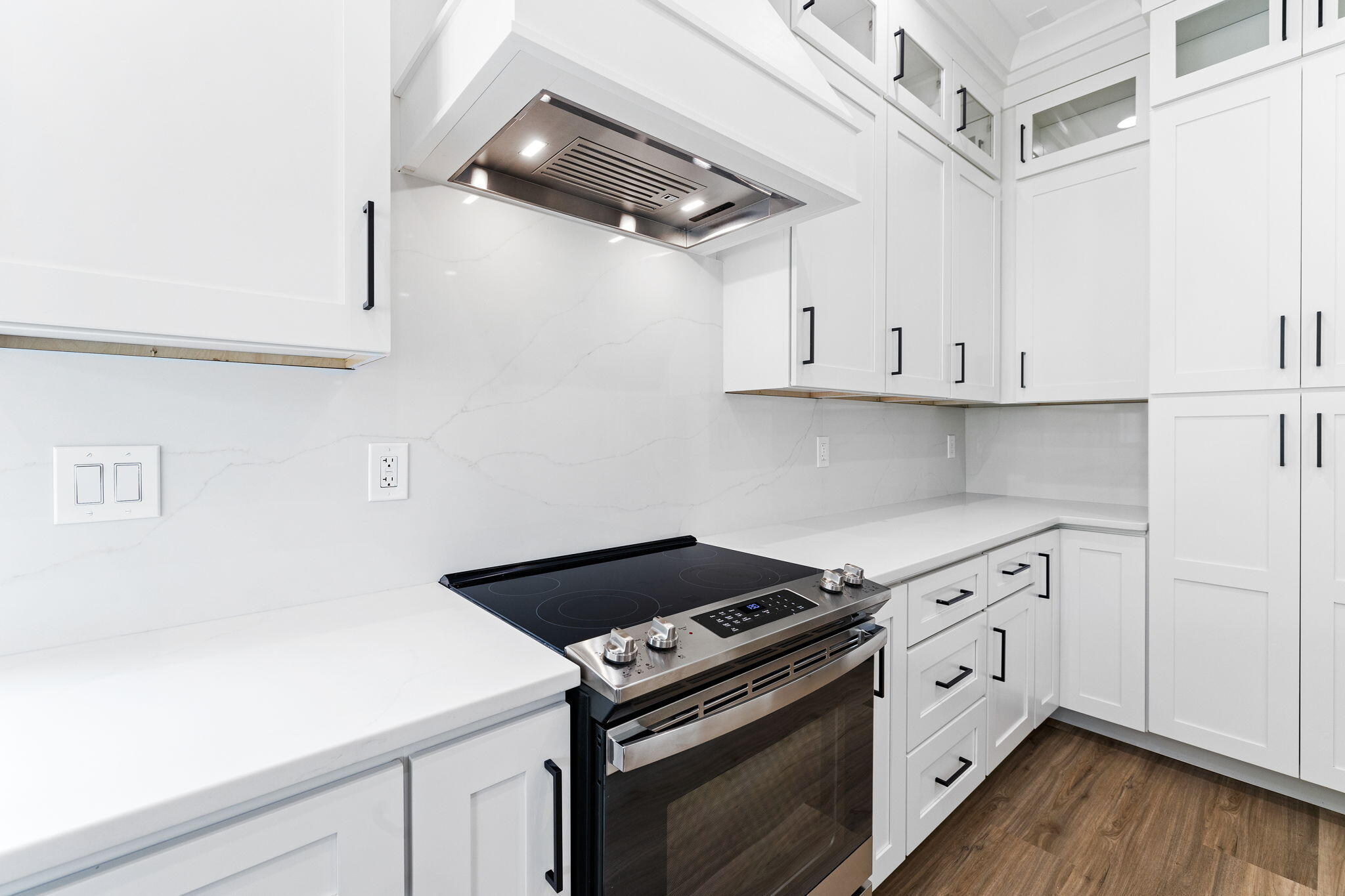 22 Georgie Street Point Washington, FL 32459 - Photo 26 of 57 a kitchen with white cabinets and white appliances