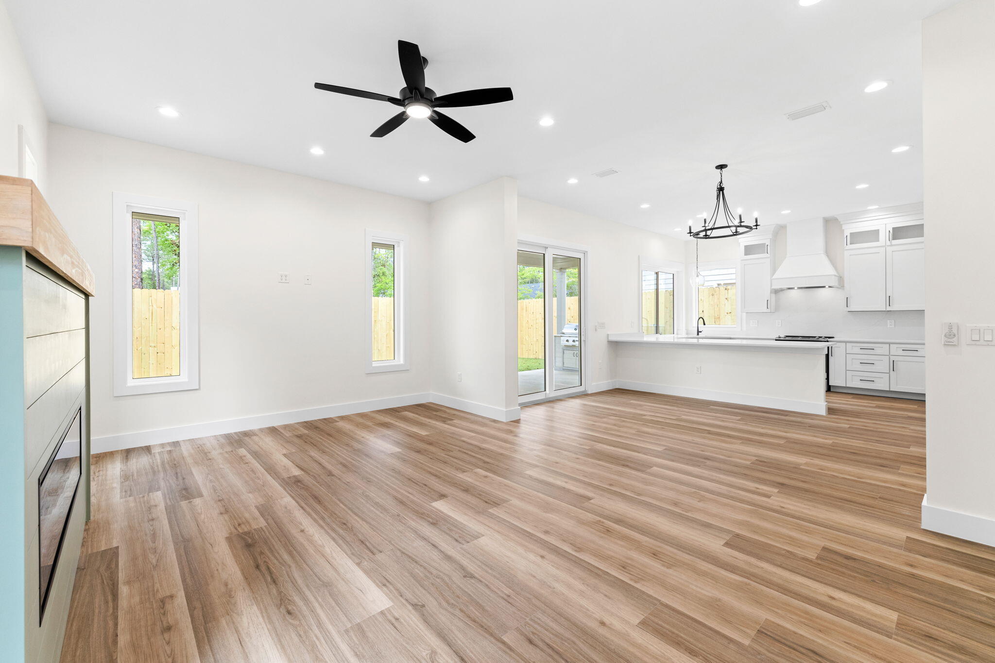 22 Georgie Street Point Washington, FL 32459 - Photo 31 of 57 a view of a kitchen with wooden floor and a window
