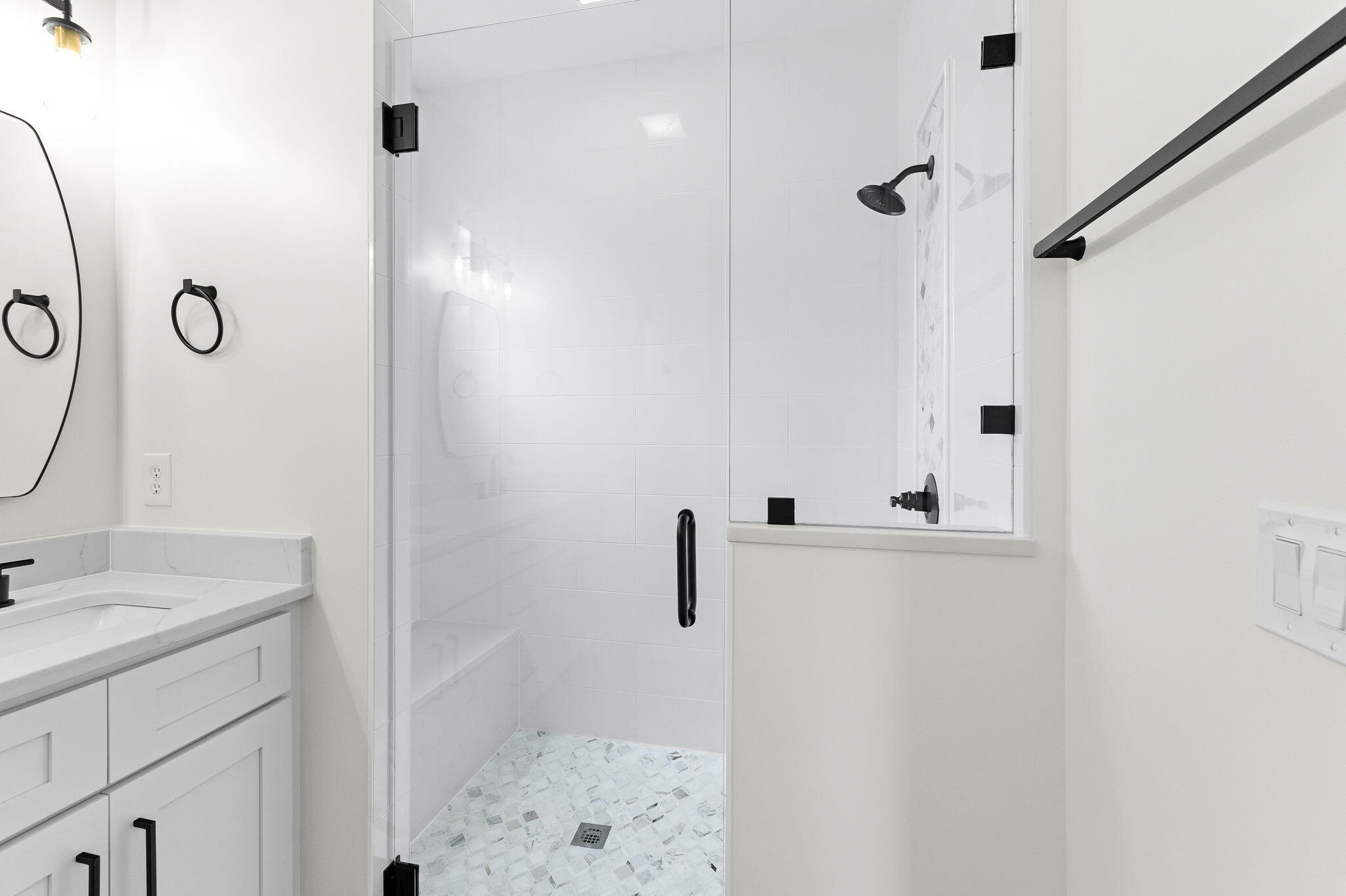 22 Georgie Street Point Washington, FL 32459 - Photo 46 of 57 a bathroom with a shower sink and mirror