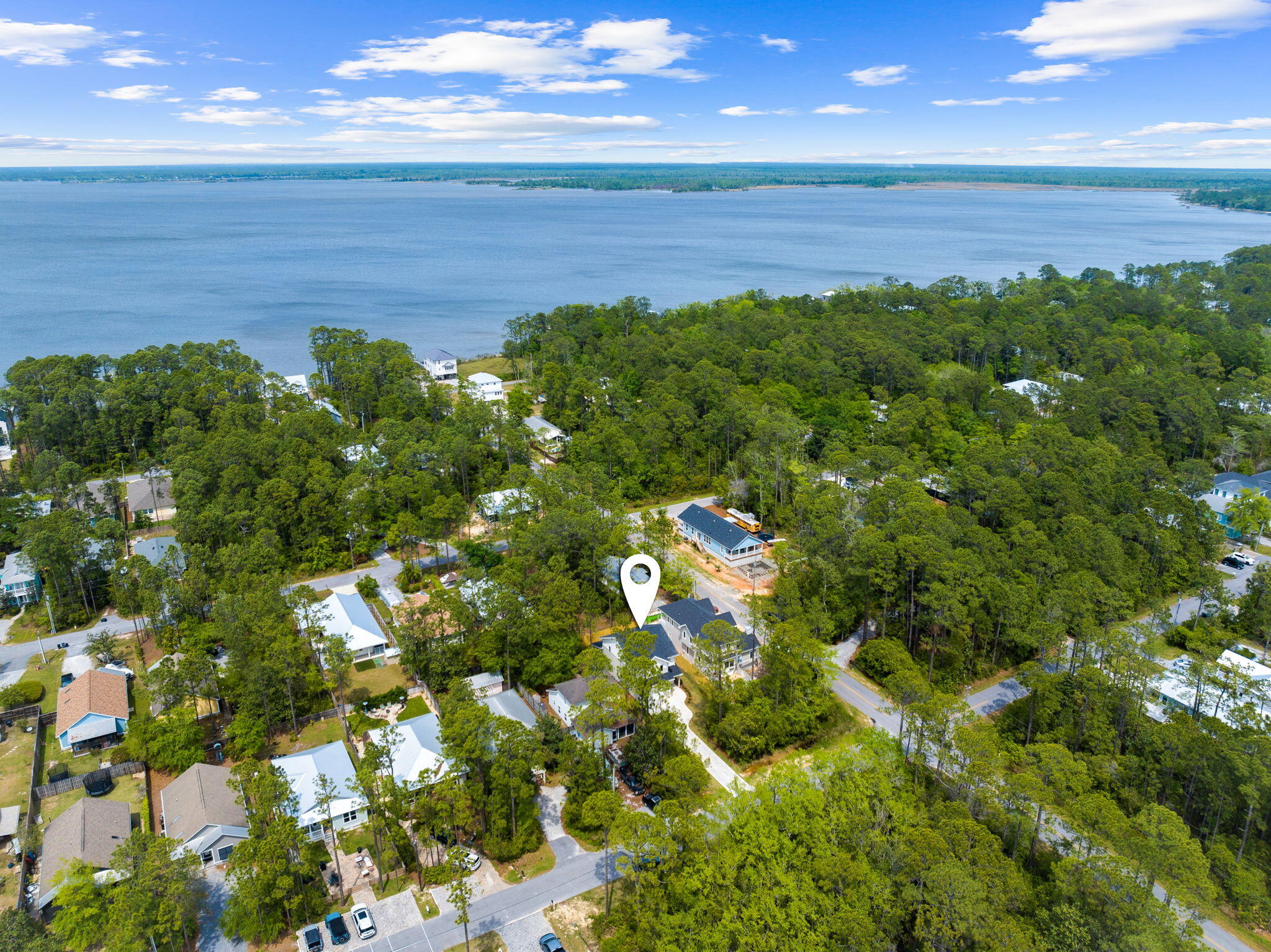 22 Georgie Street Point Washington, FL 32459 - Photo 5 of 57 a view of a lake with a yard