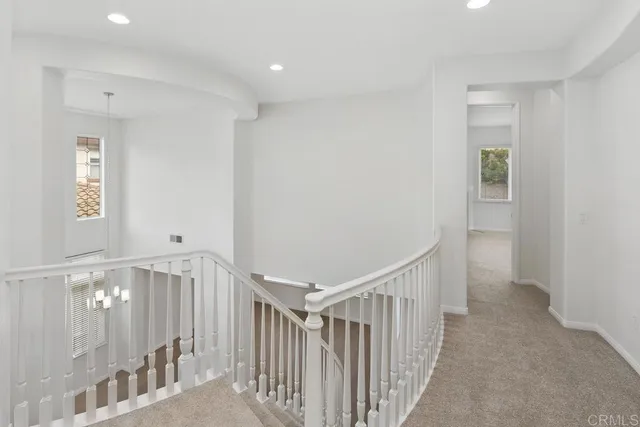 a view of a hallway with entryway